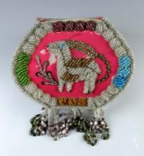 7" wide by 8 1/2" high Iroquois Beaded Box dated 1913. Bright pink fabric shows some age.