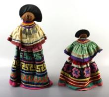 Pair of Indian dolls with nicely quilted dresses and beadwork. Tallest is 15".