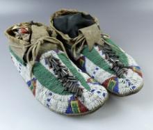 Beaded pair of 10 1/2" Vintage Plains Indian Moccasins from the late 1800's - early 1900's.