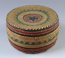 4 3/16" diameter by 2 3/8" tall Northwest Coast Trinket Basket that is very well made.