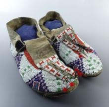 Nice beaded 11 1/2" pair of Vintage Sioux Leather Moccasins with no visible bead loss.