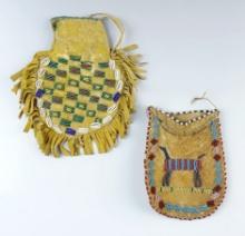 Pair of beaded Strike-a-light Bags with no visible bead loss. One has a small hole on reverse side.