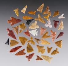 Set of 40 colorful New Mexico Points. Some have damage. The largest is 1 1/16".
