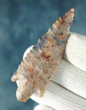 Exceptional 2 5/8" serrated Stemmed Neolithic Point. Northern Sahara Desert region of Africa.