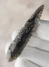 2 3/4" Canalino with excellent flaking and serrations. Made from Obsidian, found in California.