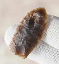 1 7/16" Paleo Hell Gap made from well patinated Knife River Flint. Found in North Dakota. COA's.