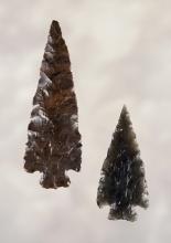 Nice pair of Rose Springs Points, one is made from Mahogany Obsidian. Larger is 2". California.