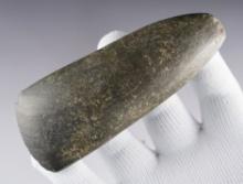 4 7/8" Ohio Celt made from Banded Slate. This is an uncommon material for this artifact type.