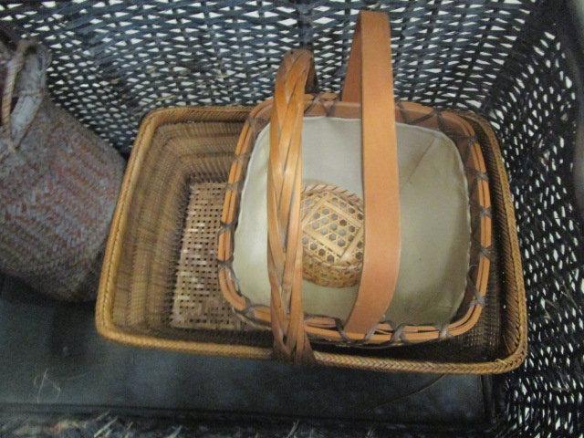 Woven Trunk Filled with Baskets