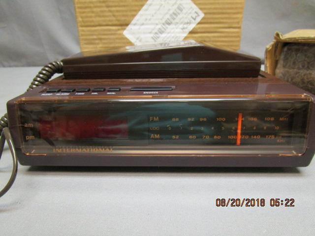 2 New Model 398 AM/FM Clock Radios w/Phone