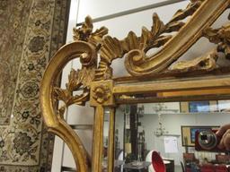 Intricately Carved Gold Framed Beveled Mirror
