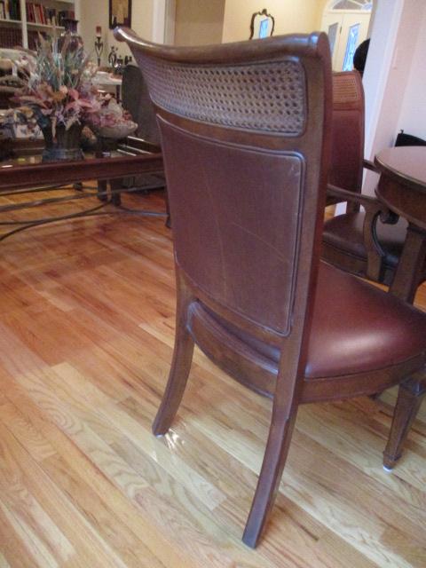 Stanley Furniture Dining Table with Six Cane/Leather Back Chairs, and Table Protectors