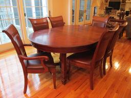 Stanley Furniture Dining Table with Six Cane/Leather Back Chairs, and Table Protectors
