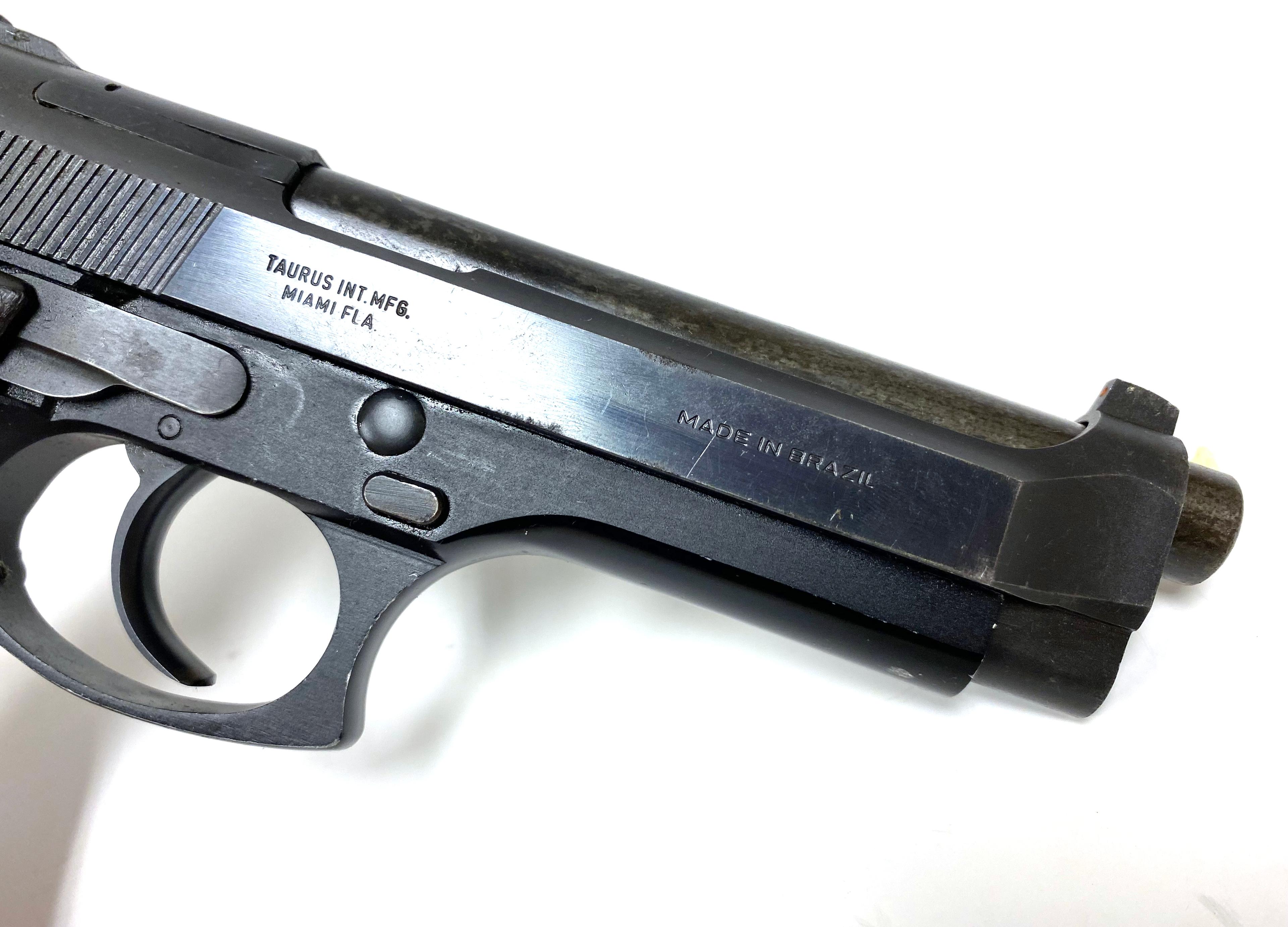 Taurus PT99AF 9MM Para. Pistol used by Officers in CIA Code Name: Alexa