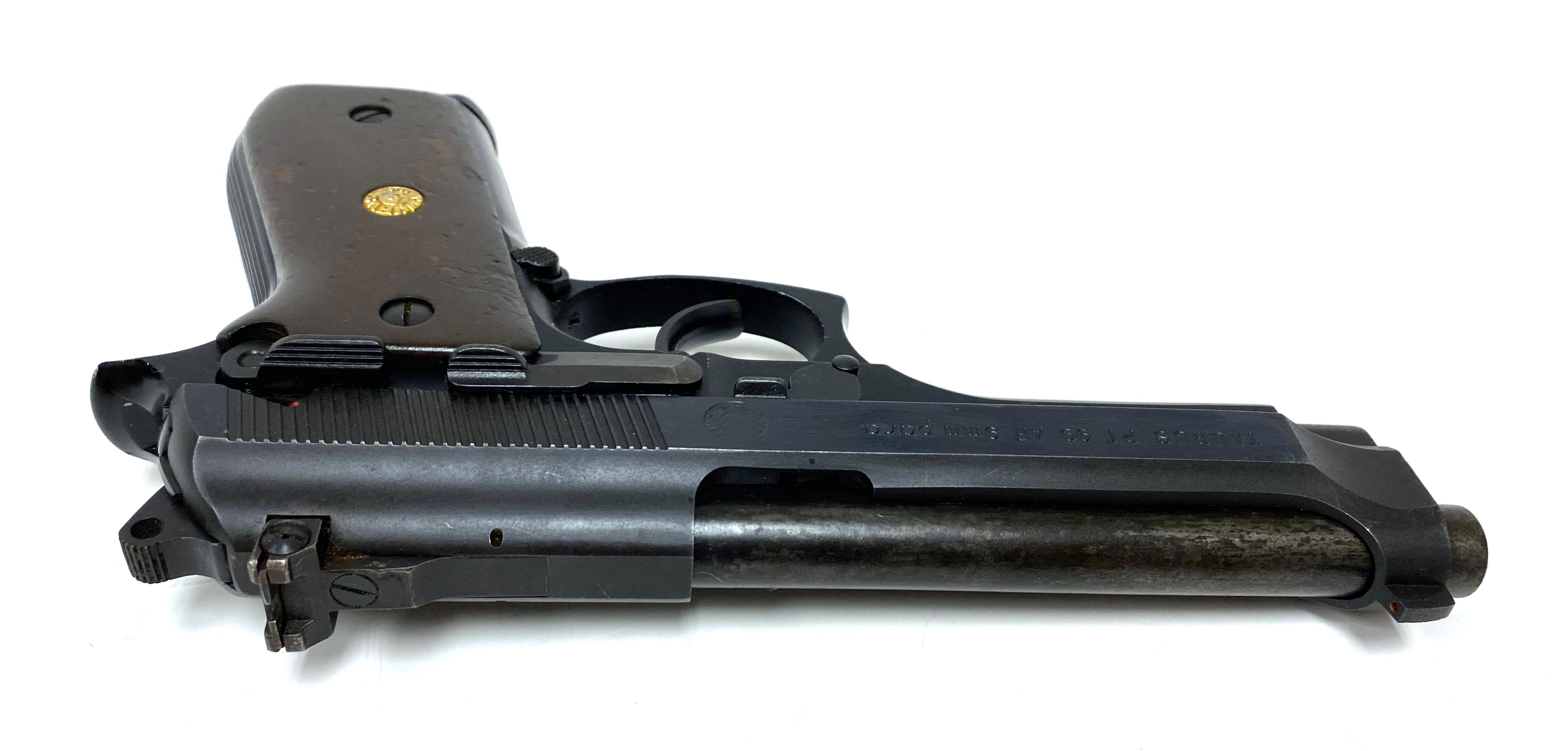 Taurus PT99AF 9MM Para. Pistol used by Officers in CIA Code Name: Alexa