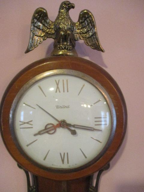 United Wood and Brass Electric Banjo Wall Clock