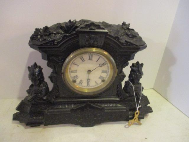 Painted Black Cast Metal Figural Mantle Clock