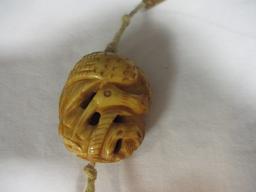 1940's Carved Ivory, Bone and Coral Netsukes