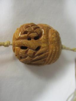 1940's Carved Ivory, Bone and Coral Netsukes