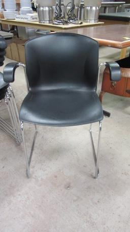 Five Harter a Jami Co. Black and Chrome Stacking Armchairs