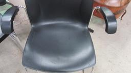 Five Harter a Jami Co. Black and Chrome Stacking Armchairs