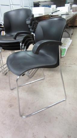 Five Harter a Jami Co. Black and Chrome Stacking Armchairs