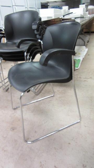 Five Harter a Jami Co. Black and Chrome Stacking Armchairs