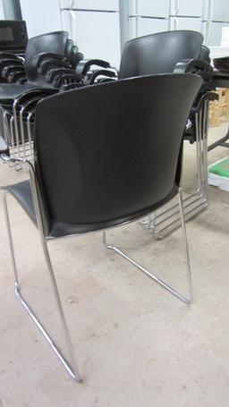 Five Harter a Jami Co. Black and Chrome Stacking Armchairs