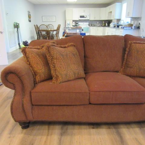 Havertys Upholstered Rolled Arm Sofa with Accent Pillows and Nail Head Accents