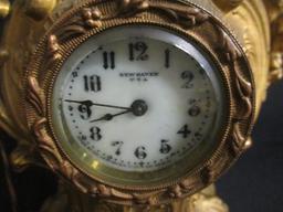 New Haven Clock Co. Brass Clock w/uranium Glass Face