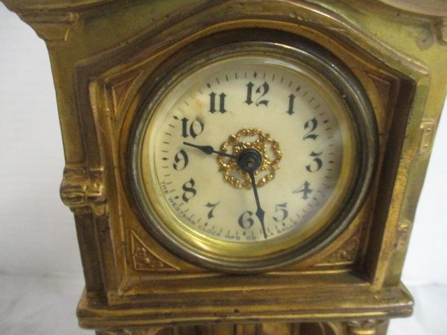 Child Playing with Clock Pendulums Cast Iron Clock