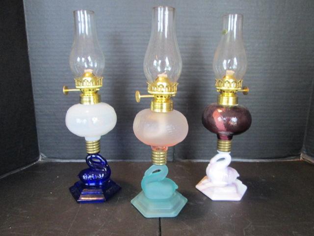 Three 1989 Heartlights Small Swan Post Oil Lamps