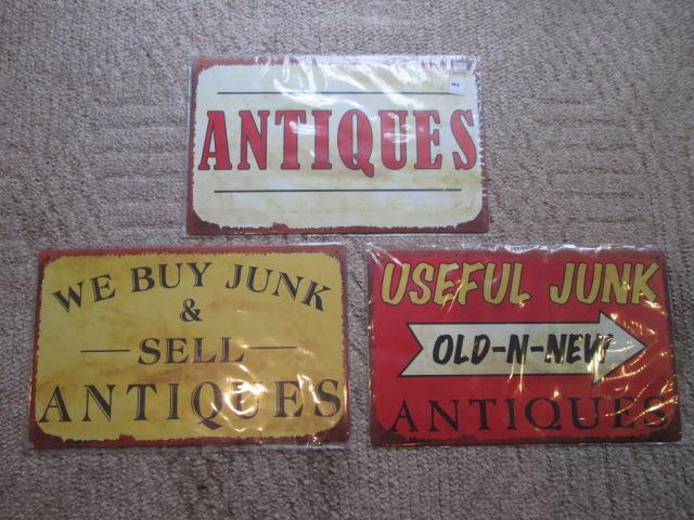 Three Metal Signs