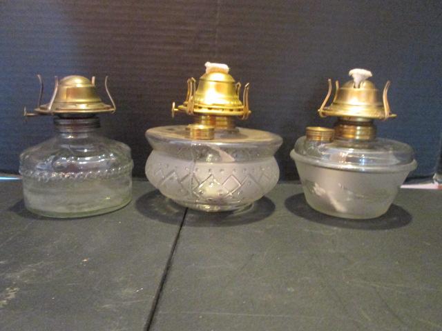 Three Clear Glass Oil Lamps