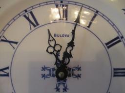 Two Round Blue and White Quartz Plate Clocks