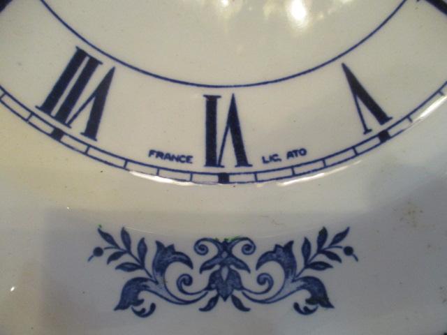 Two Round Blue and White Quartz Plate Clocks