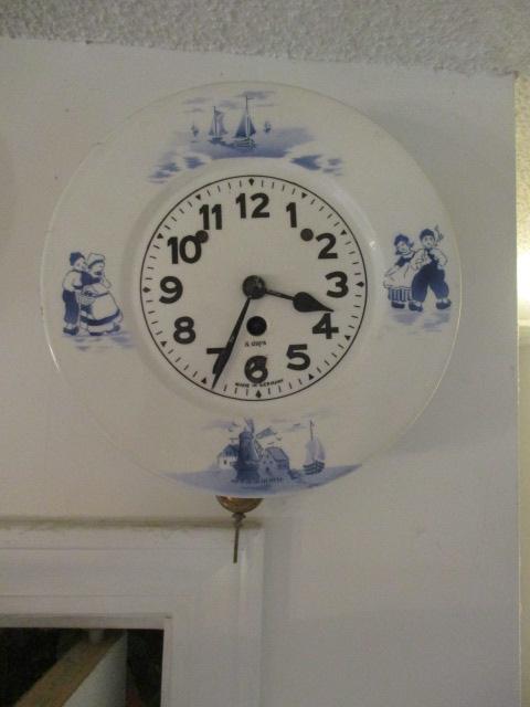 Two Round Blue and White German 8 Day Kitchen Clocks