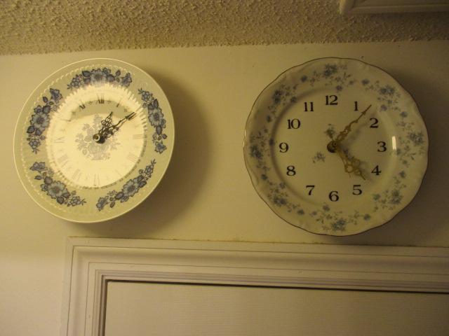 Two Blue and White Quartz Plate Clocks