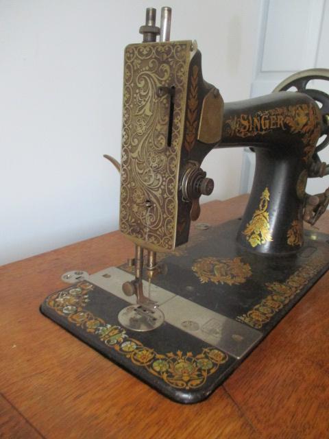 Antique Singer Treadle Sewing Machine in Tiger Oak Cabinet