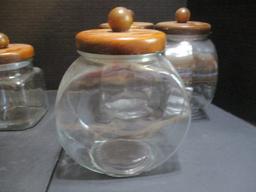 Five Glass Cannisters with Wooden Lids