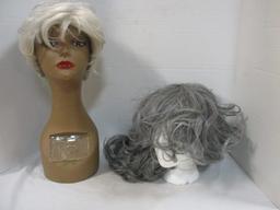 Two Cosmetology Head Models and Three Grey Wigs