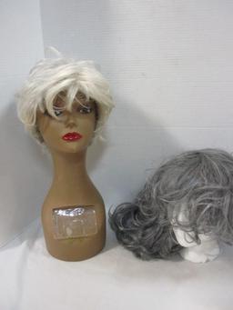 Two Cosmetology Head Models and Three Grey Wigs