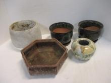 Four Pottery Flower Pots and One Pottery Candle Votive