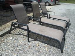 Three Black Aluminum Frame Lounge Chairs