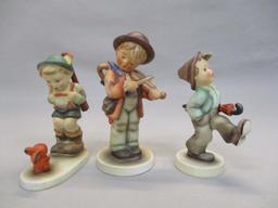 3 Goebel Hummel Figurines "Little Fiddler"  6" - "Happy Traveler"  5" - "Sensitive Hunter " 5"  Has