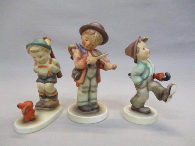 3 Goebel Hummel Figurines "Little Fiddler"  6" - "Happy Traveler"  5" - "Sensitive Hunter " 5"  Has