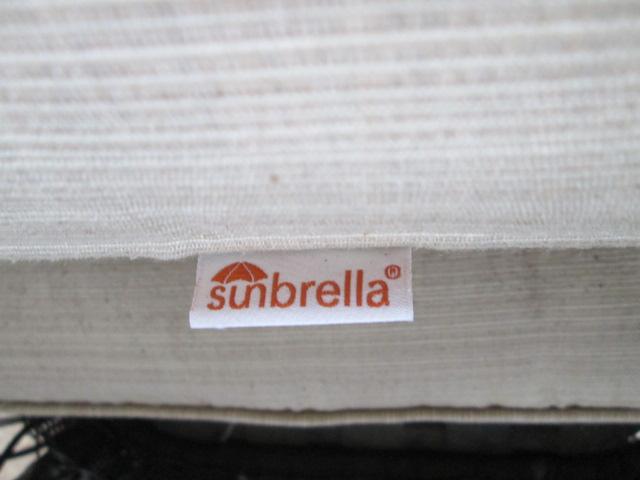 Woven Resin Wicker Swiveling Glider with Sunbrella Cushions