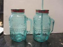 Two Pioneer Woman Glass Drinking Jars with Handles.