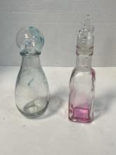 Tinted Glass Bulb Top Decanter and Knights Head Top Decanter 7 1/4'' Tall and 8'' Tall.