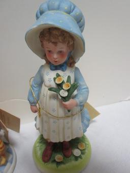 Four Holly Hobby Figurines and Old Man and Woman Figurine.